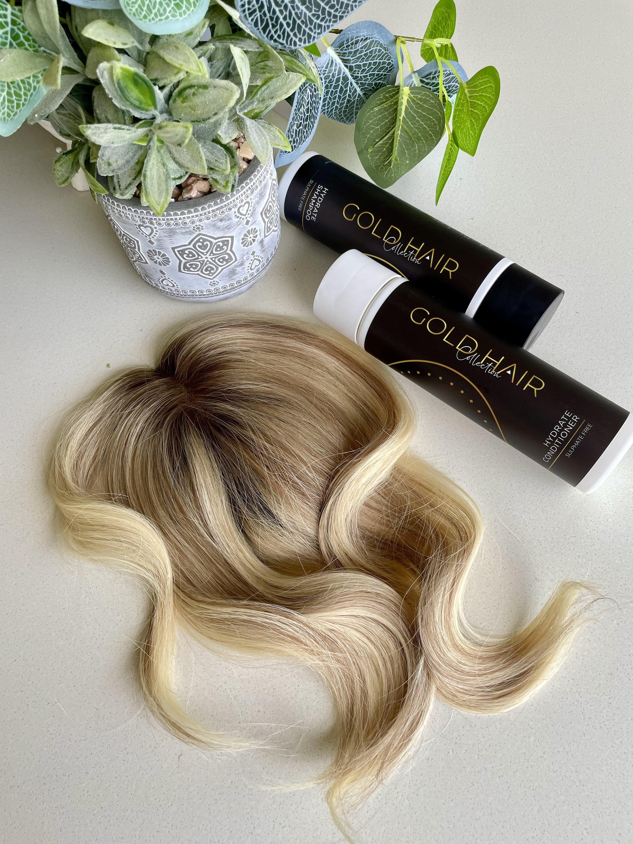 Premium hair topper with care products