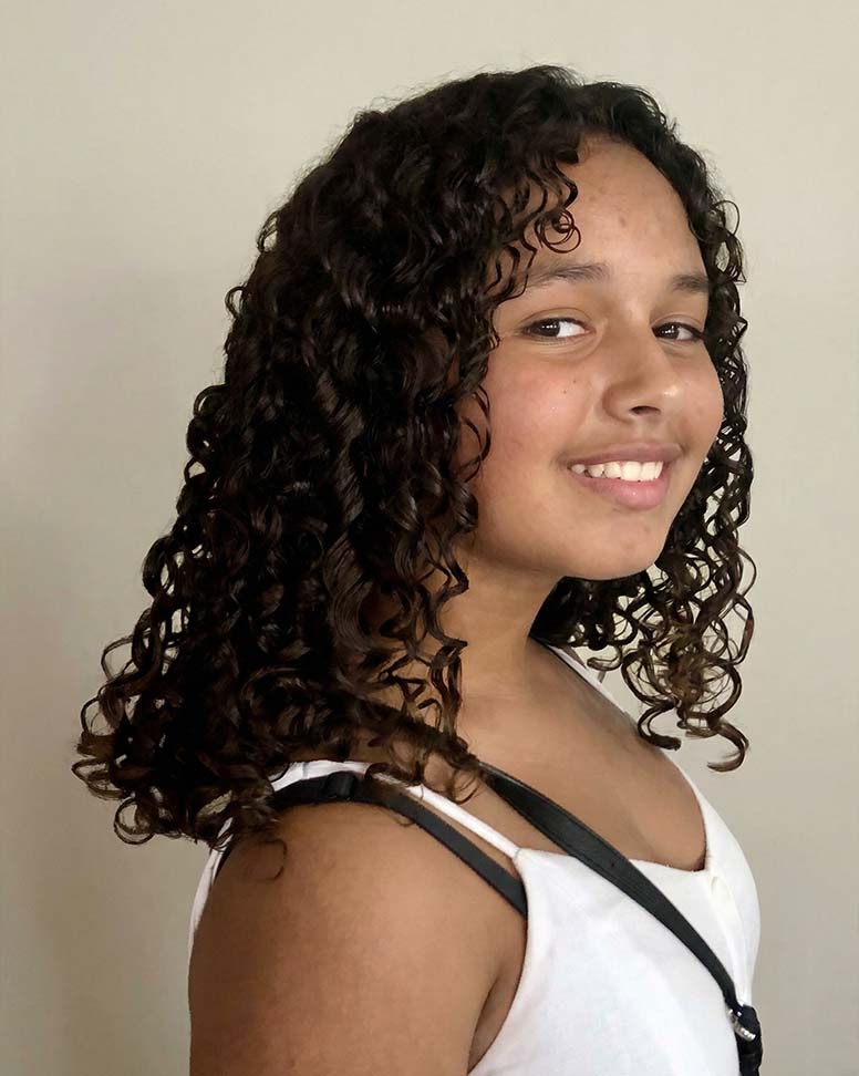 Defined, bouncy curls shaped with care and precision.